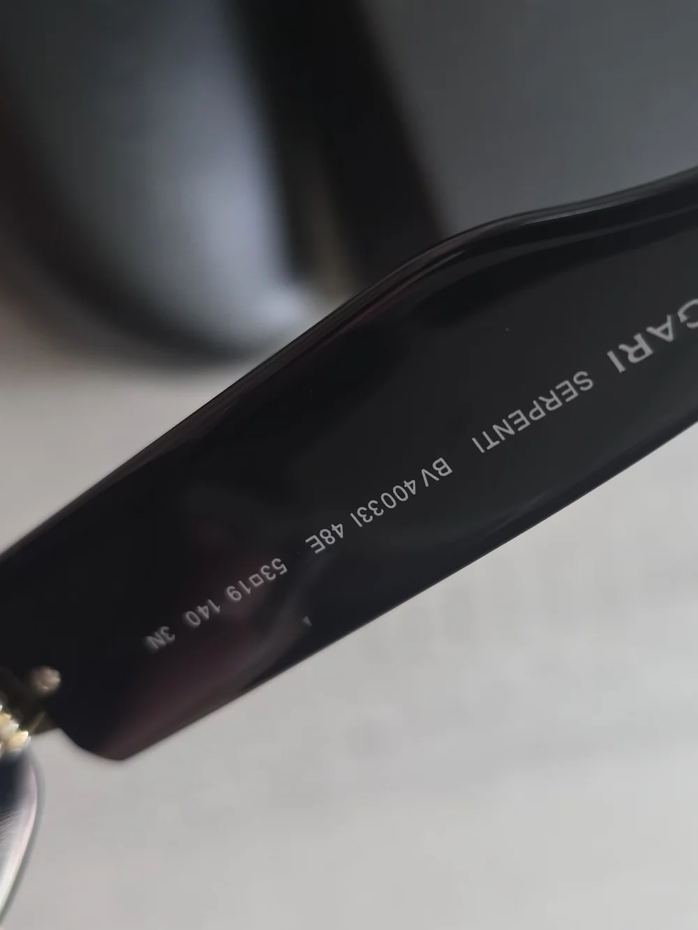 Bulgari Black Cat-Eye Sunglasses with Gold Accent